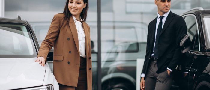 young-couple-choosing-car-car-showroom