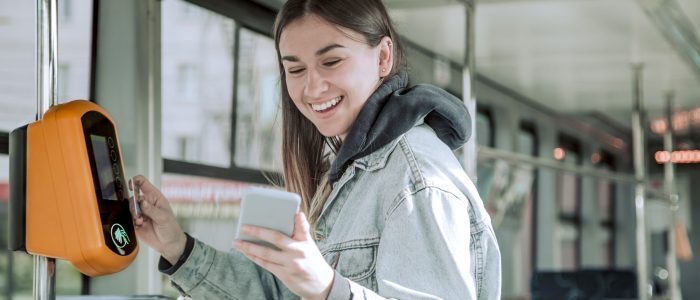 young-woman-contactless-pays-public-transport